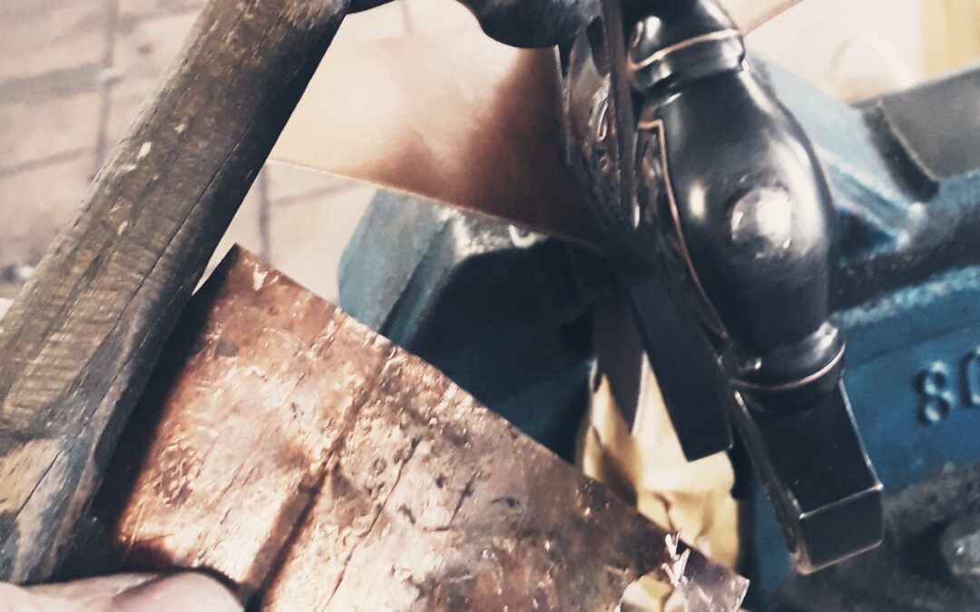 Riveting the sword handle